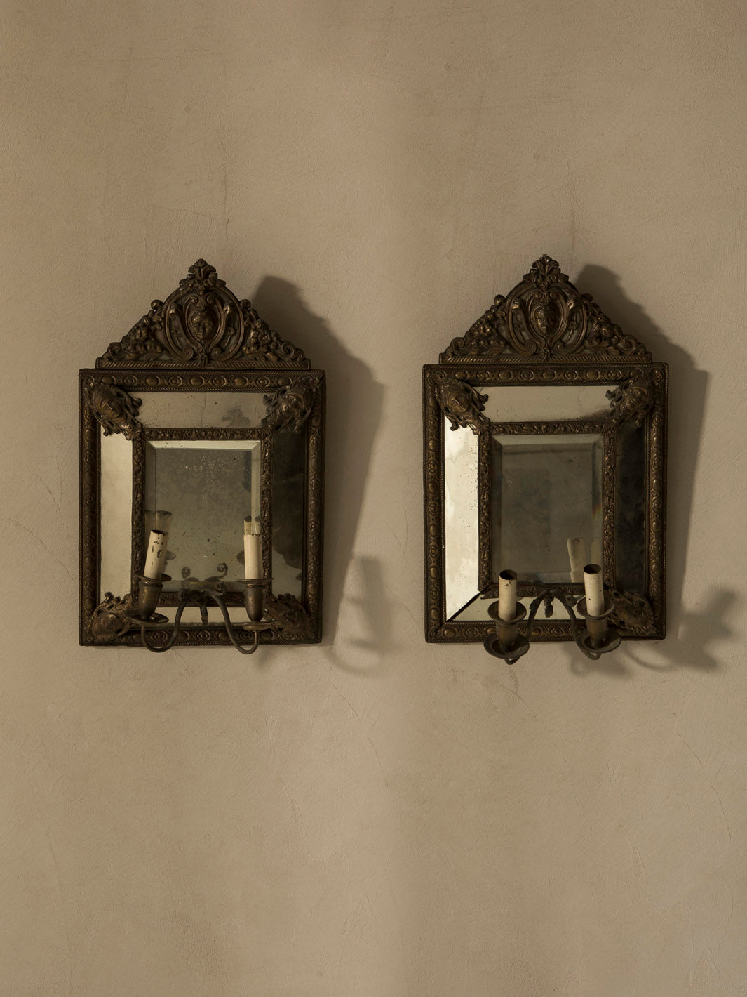 Pair of mirror & bronze Roma wall lights from the 40s