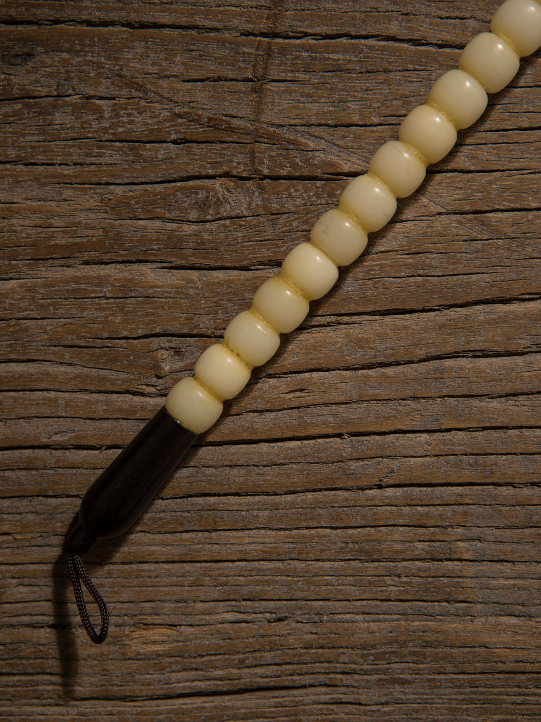 Decorative black and white stone brush