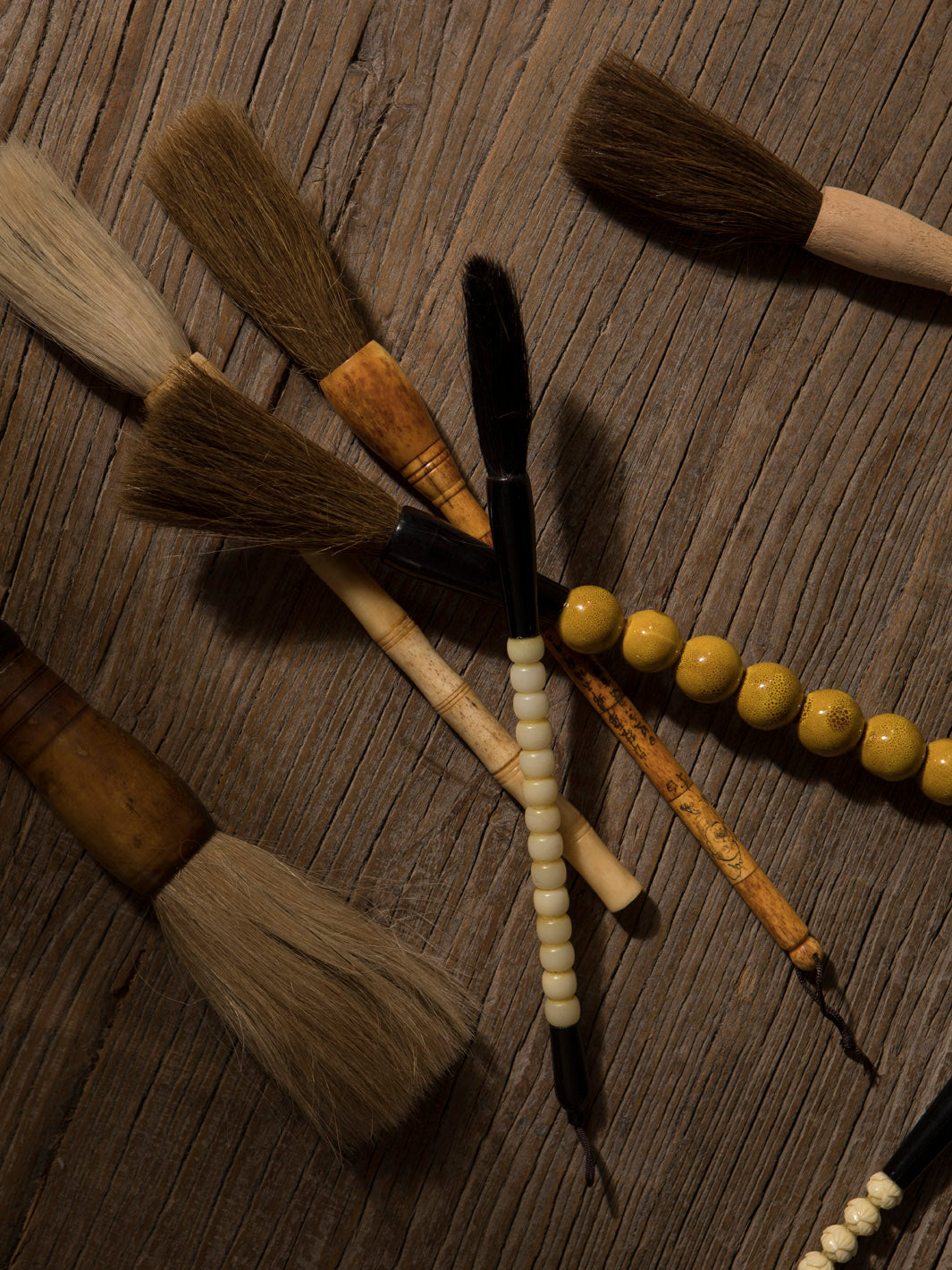 Decorative black and white stone brush