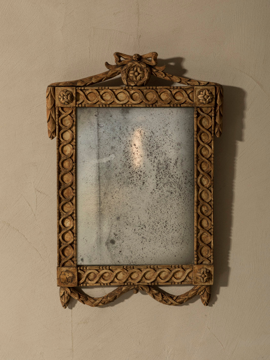 Pair of Bavarian bow-tipped mirrors, 19th century