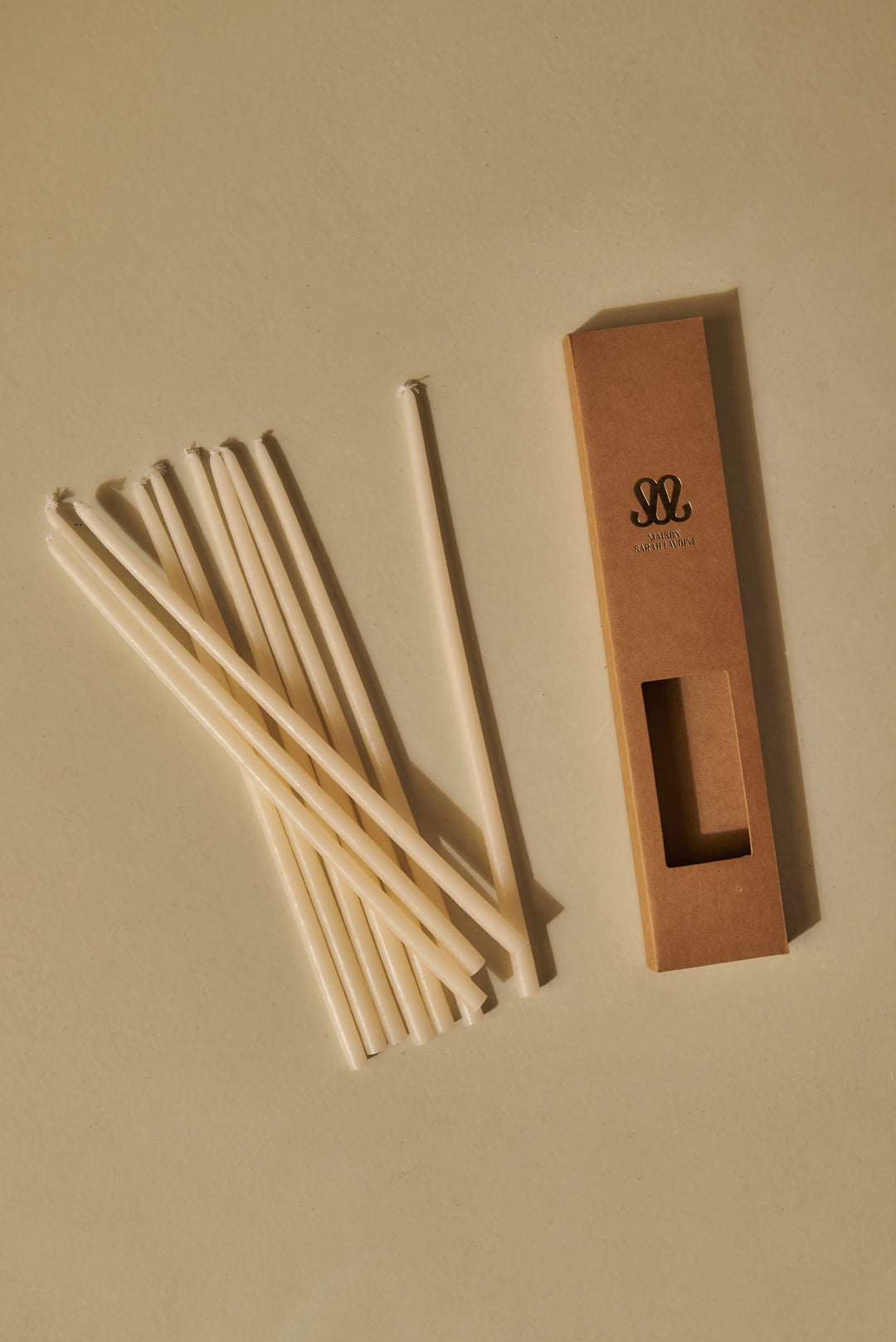Pack of 12 thin ecru candles