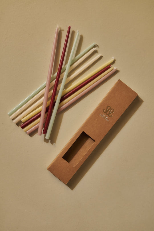 Pack of 12 slim pastel candles