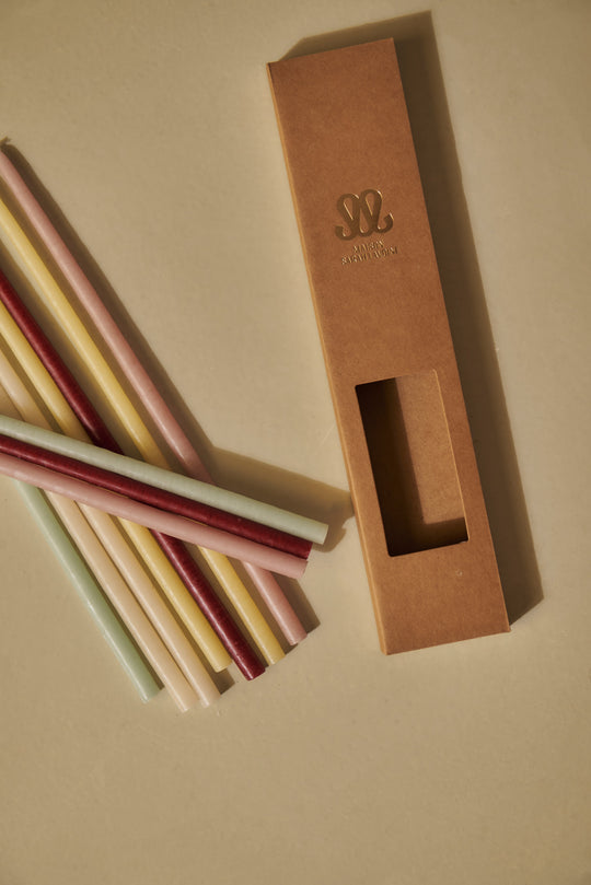 Pack of 12 slim pastel candles