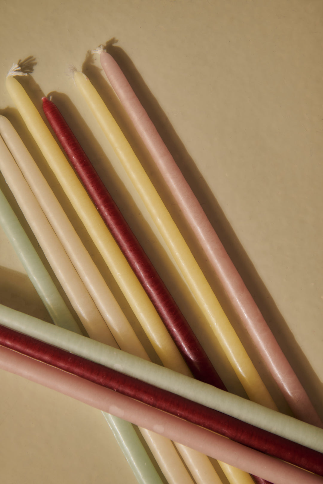 Pack of 12 slim pastel candles