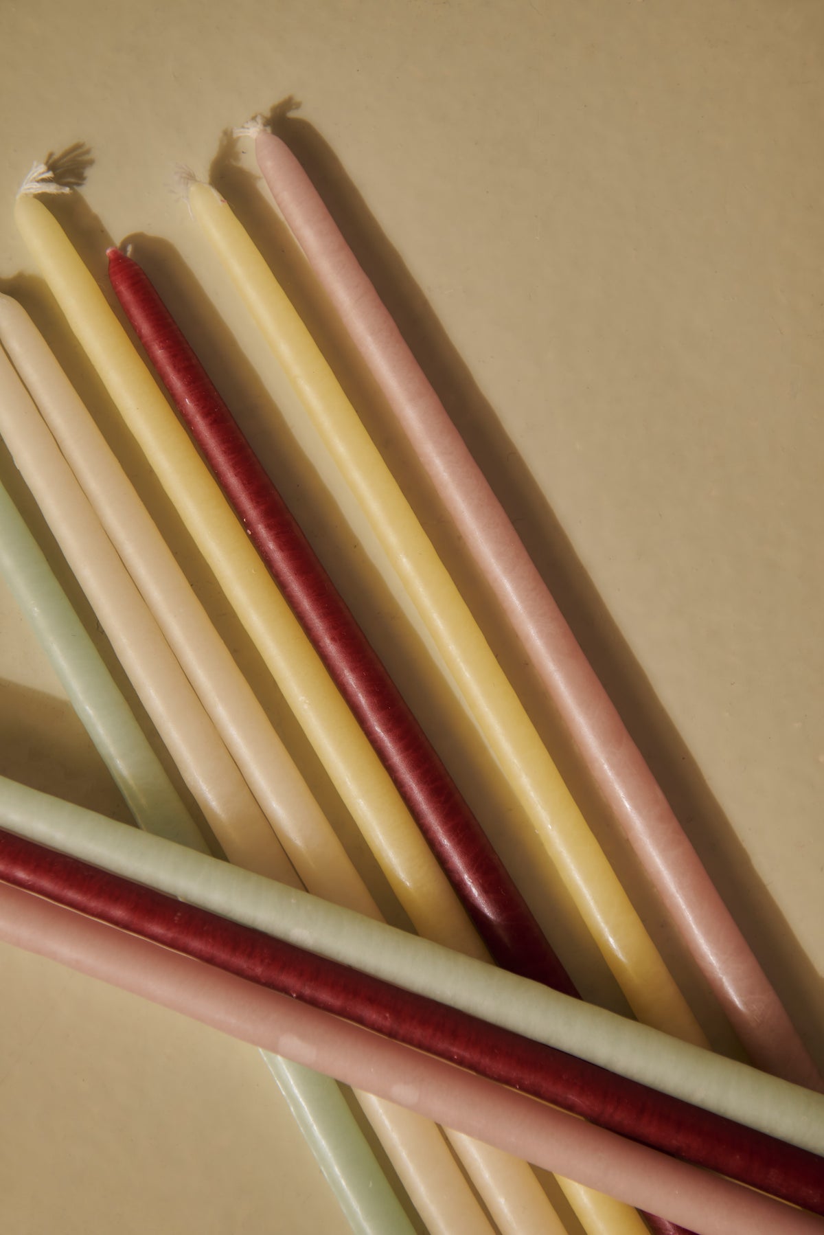 Pack of 12 slim pastel candles