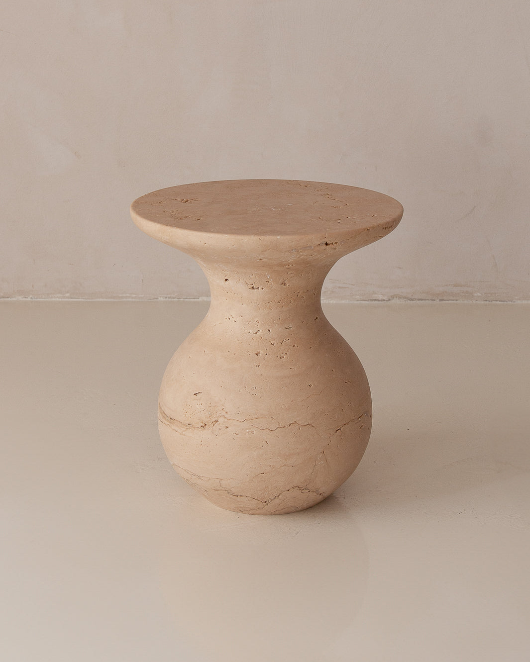 Baby Italia travertine side table