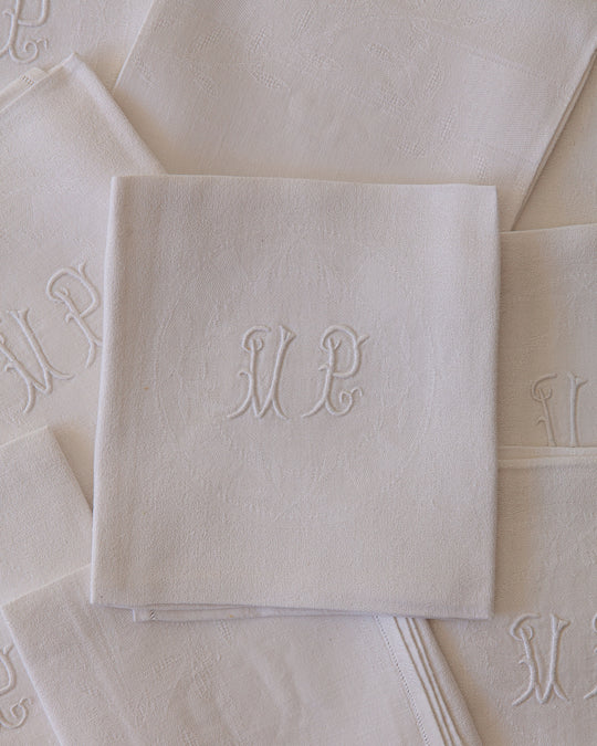 Lot de 10 serviettes damassées blanches "UP"