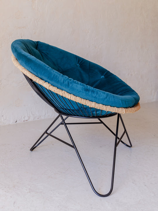 Round blue velvet armchair