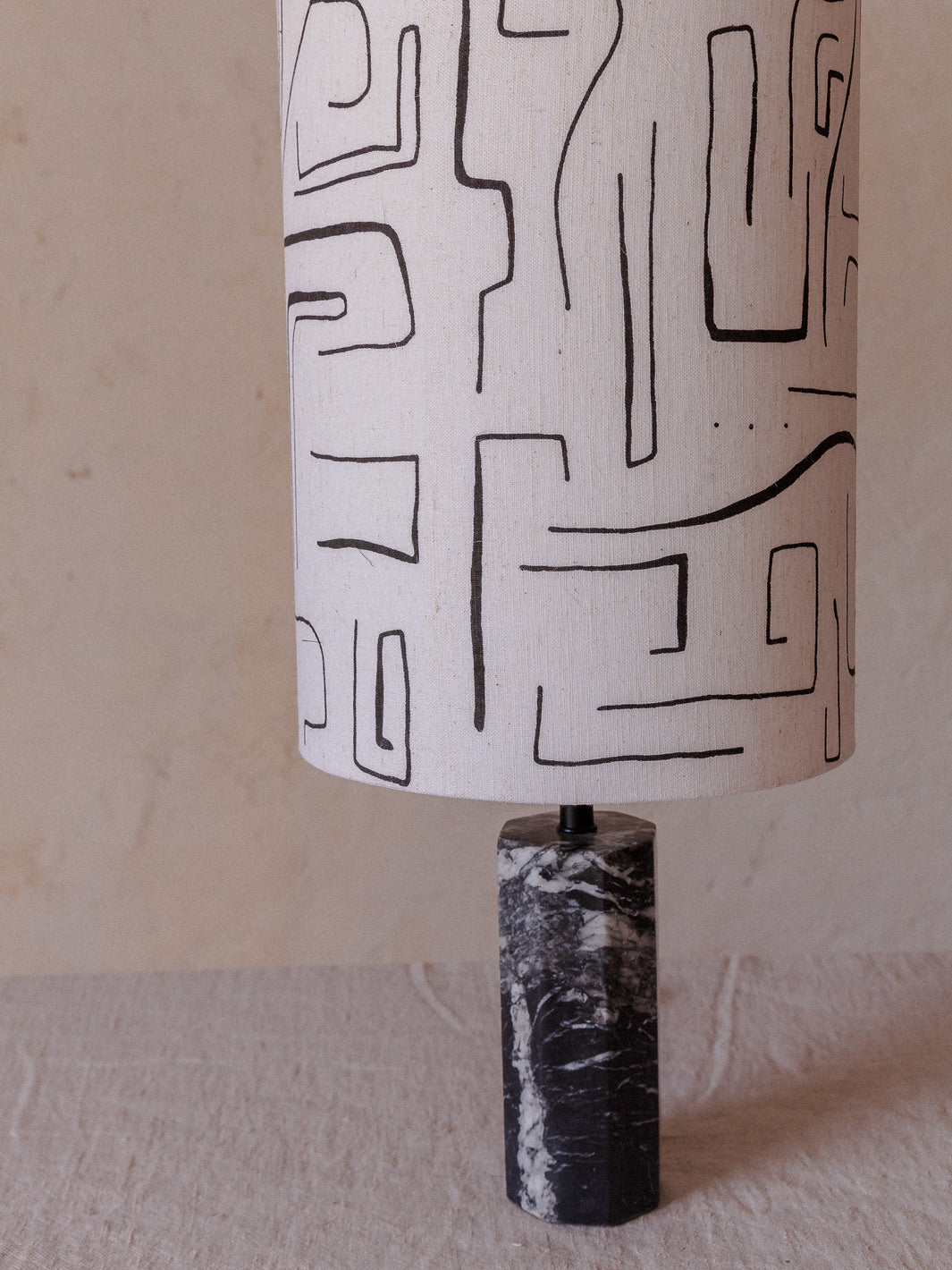 Hexagonal marble lamp with black lines shade