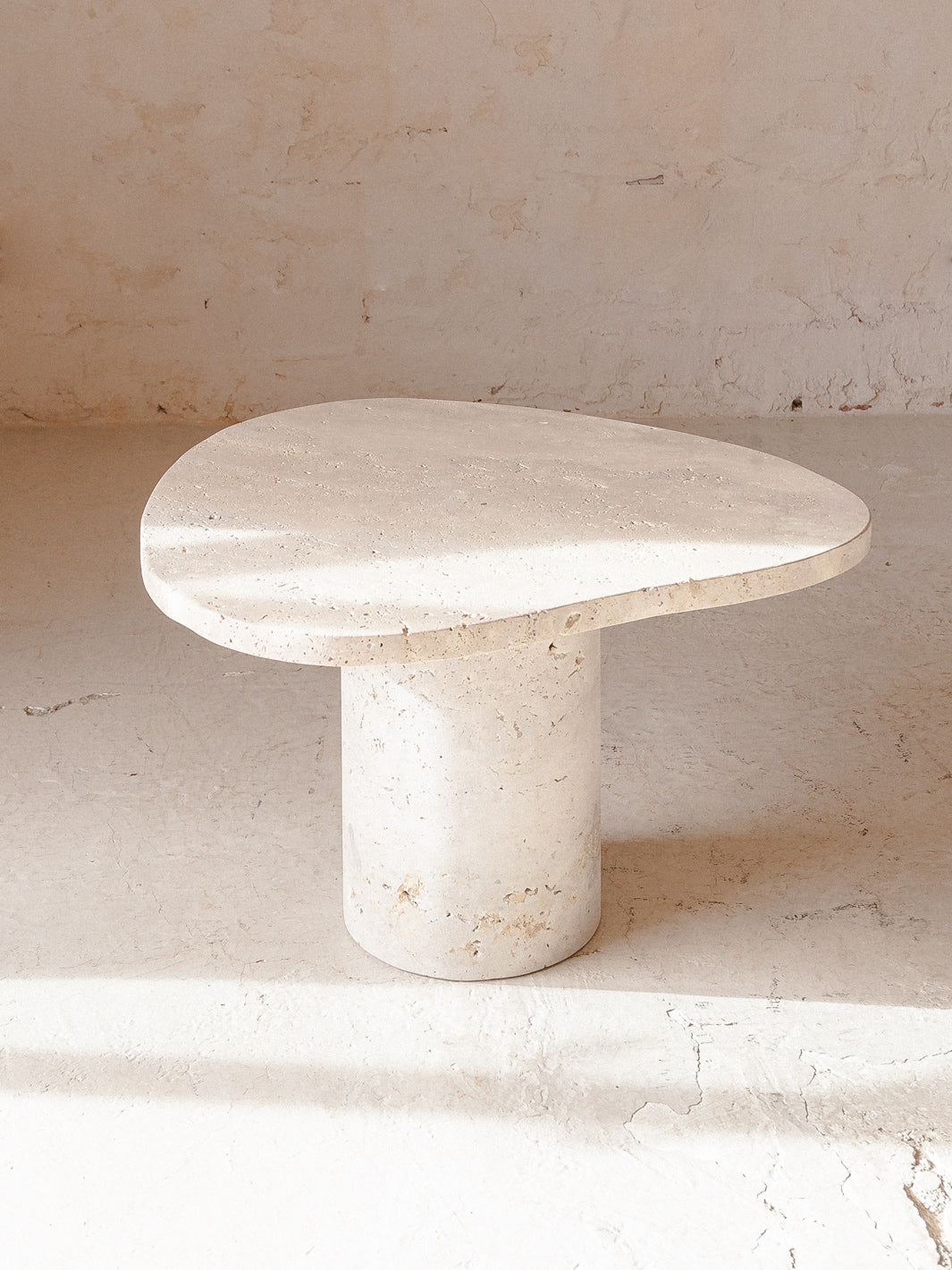 Organic travertine marble table Galet 40H