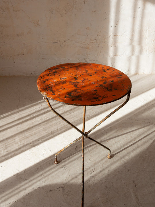 Red three-foot table from the 50s
