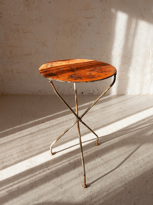 Red three-foot table from the 50s