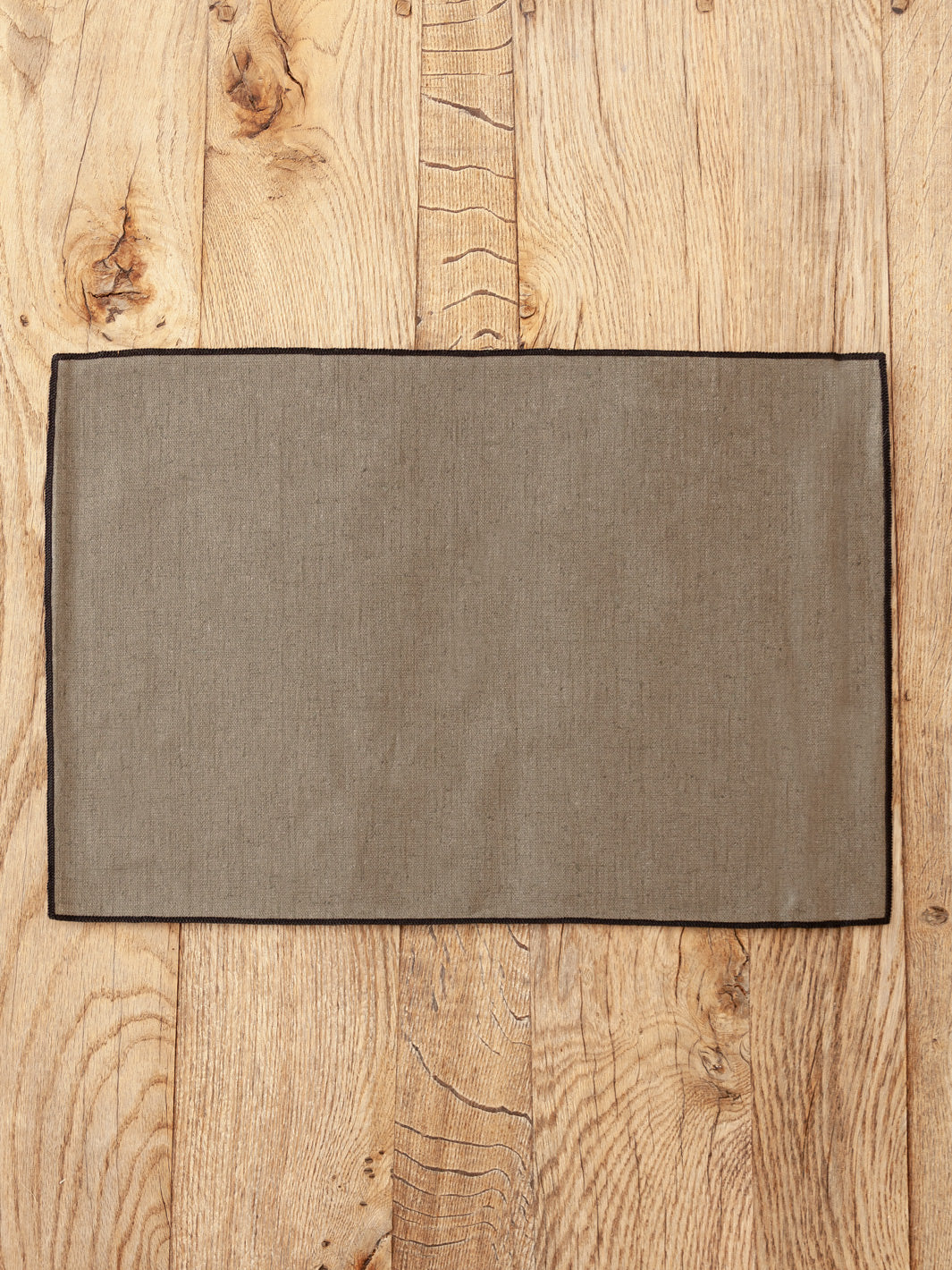 Khaki coated linen placemat
